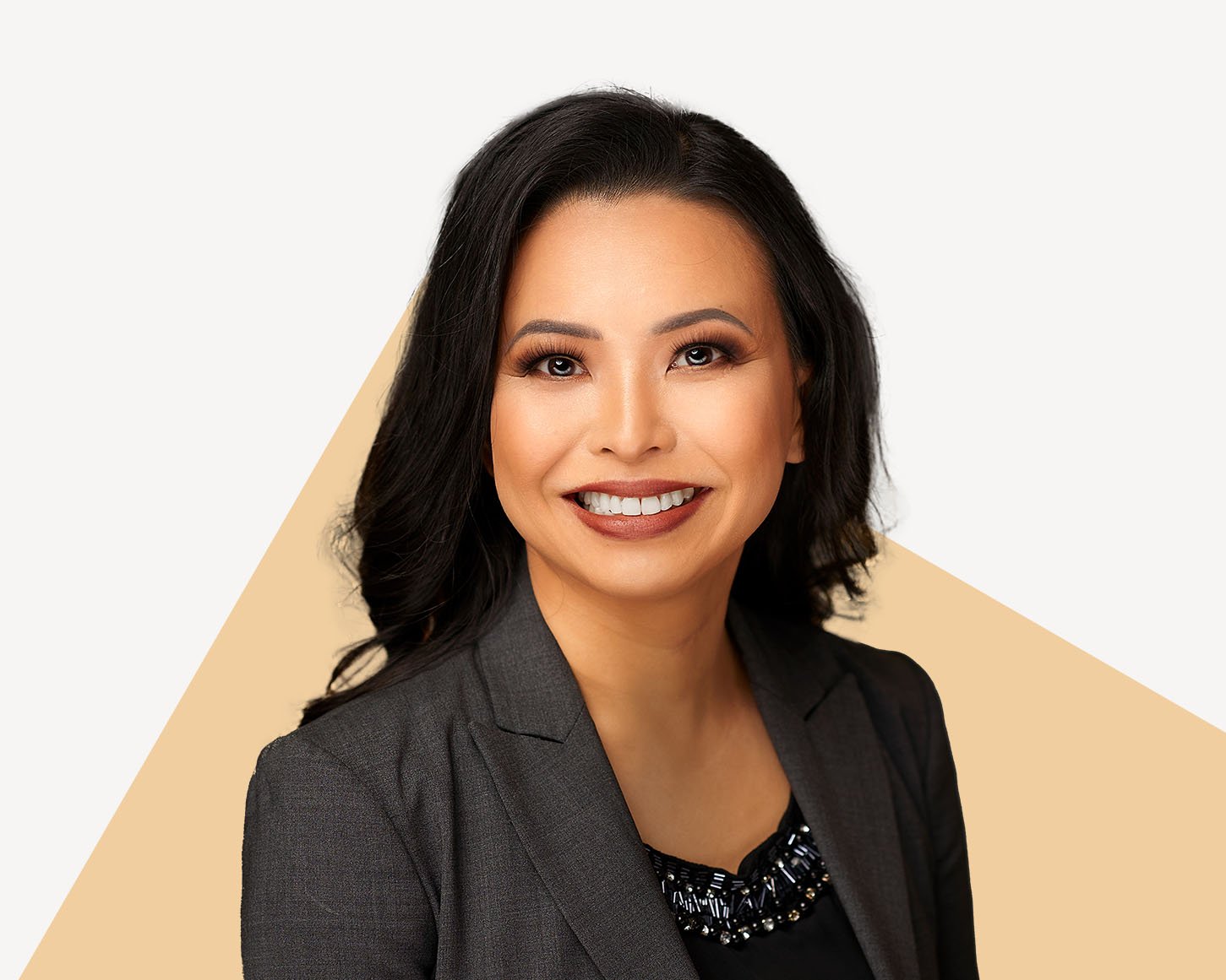 Sandy Van, Esq., Owner of Van Law Firm Injury and Accident Attorneys, smiling in business attire.