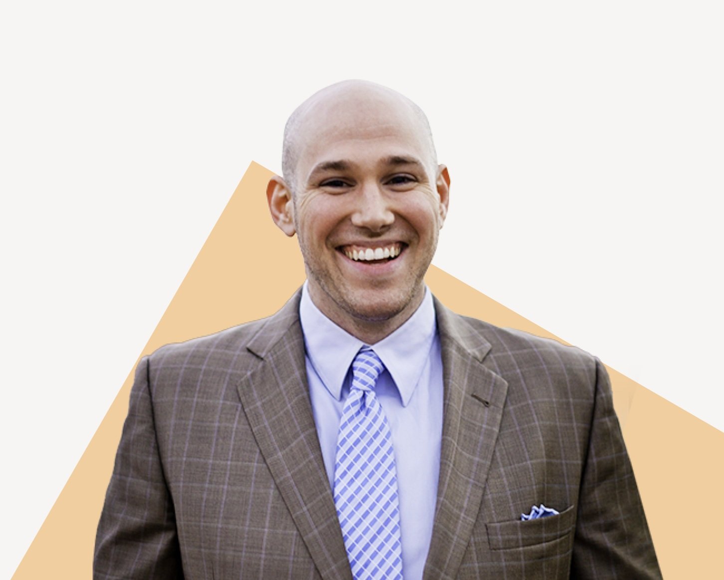 Joe Schipani, Managing Partner at Cross/Section and Cross/Section Capital, smiling in a suit and tie.