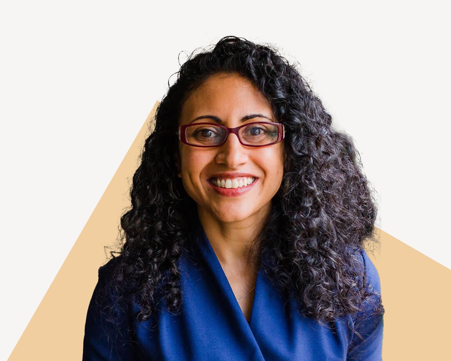 Rupal Patel, Ex-CIA, 2x CEO, wearing business professional attire and smiling.